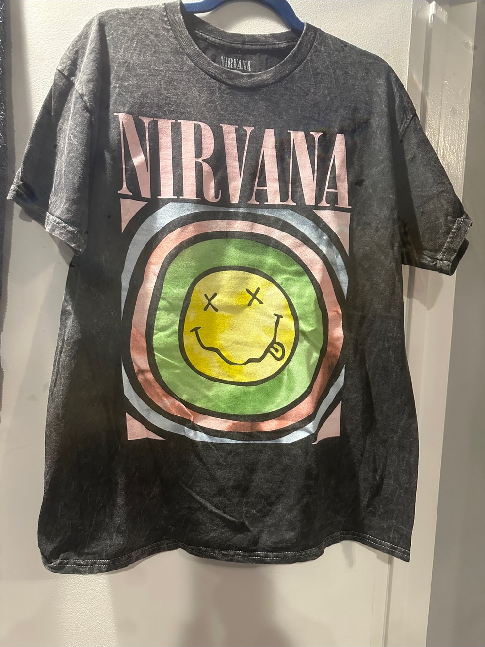 NIRVANA Black Tee with Pastel Pink Logo and Yellow Smiley